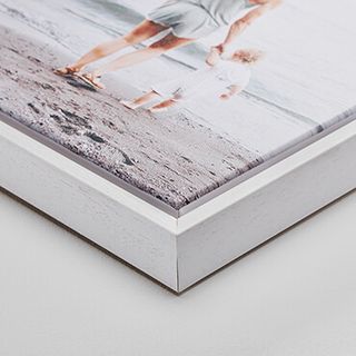 White wood frame, 1.75" deep.