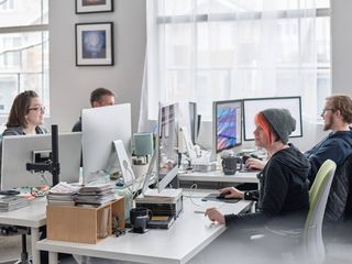Canvaspop designers working on your image.