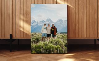 Canvas print of a dad and sons on a hike in the mountains