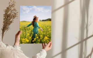 canvas print of mom walking in a flower field