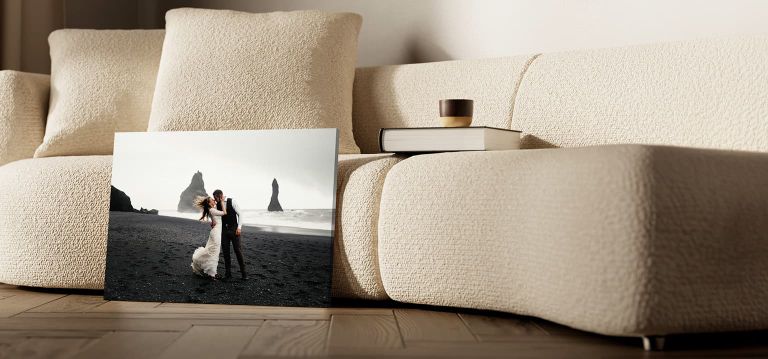 Canvas print of people in front of the mountains on a black background.