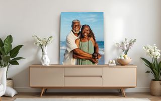 Canvas print of a couple embracing on a beach