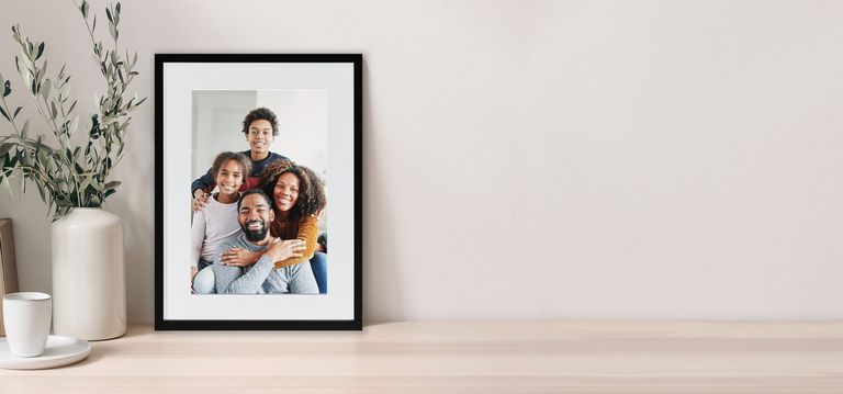 Framed print of family portrait