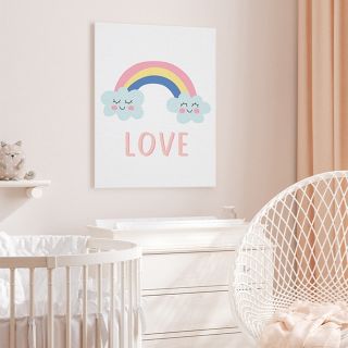 A framed print positioned above a child's bed.