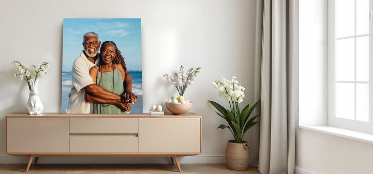 Canvas print of a couple embracing on a beach